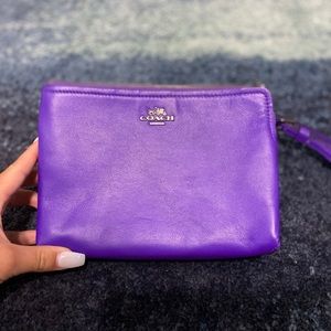 purple coach clutch